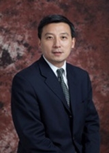 薛群