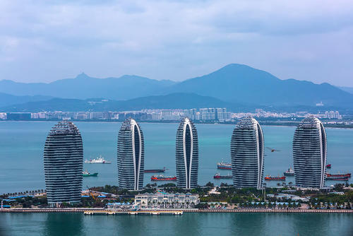  對(duì)標(biāo)香港、“碾壓”新加坡，海南自貿(mào)港低稅率有多誘人？