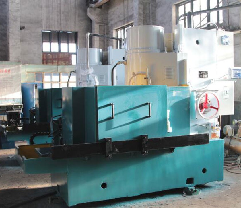 Vertical spindle surface grinding machine with rotary table
