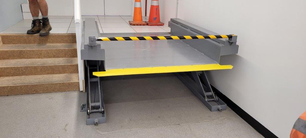The Southworth low-profile floor height lift table, with pallet table, is basically flat with the gr